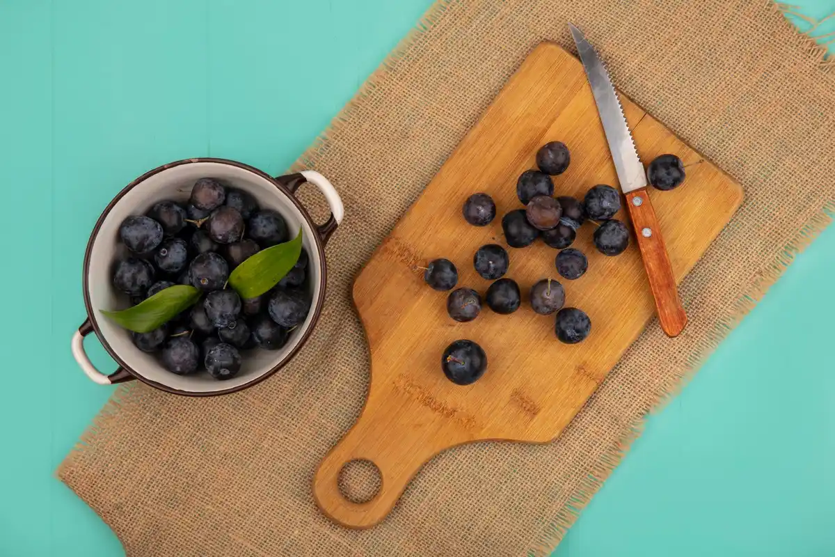 fresh blueberries with coffee grounds background