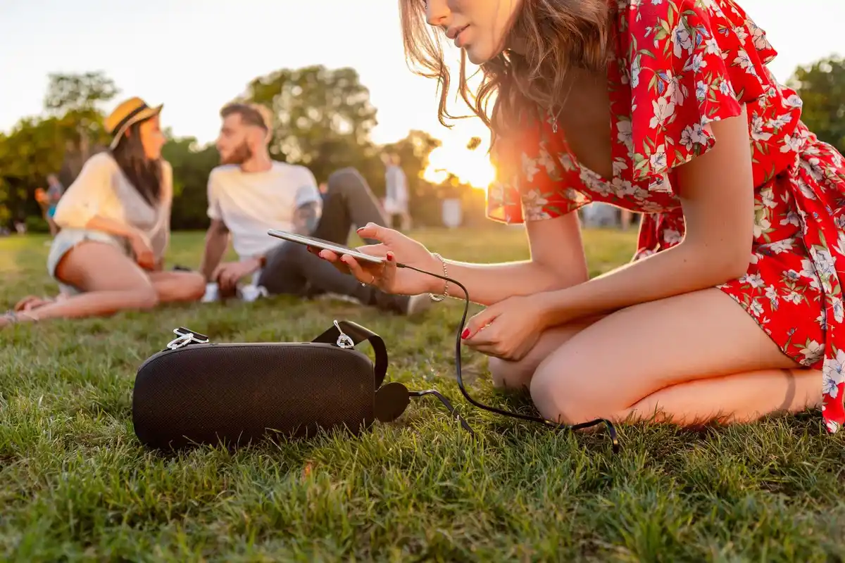 Dutch backyard with smart garden devices app interface