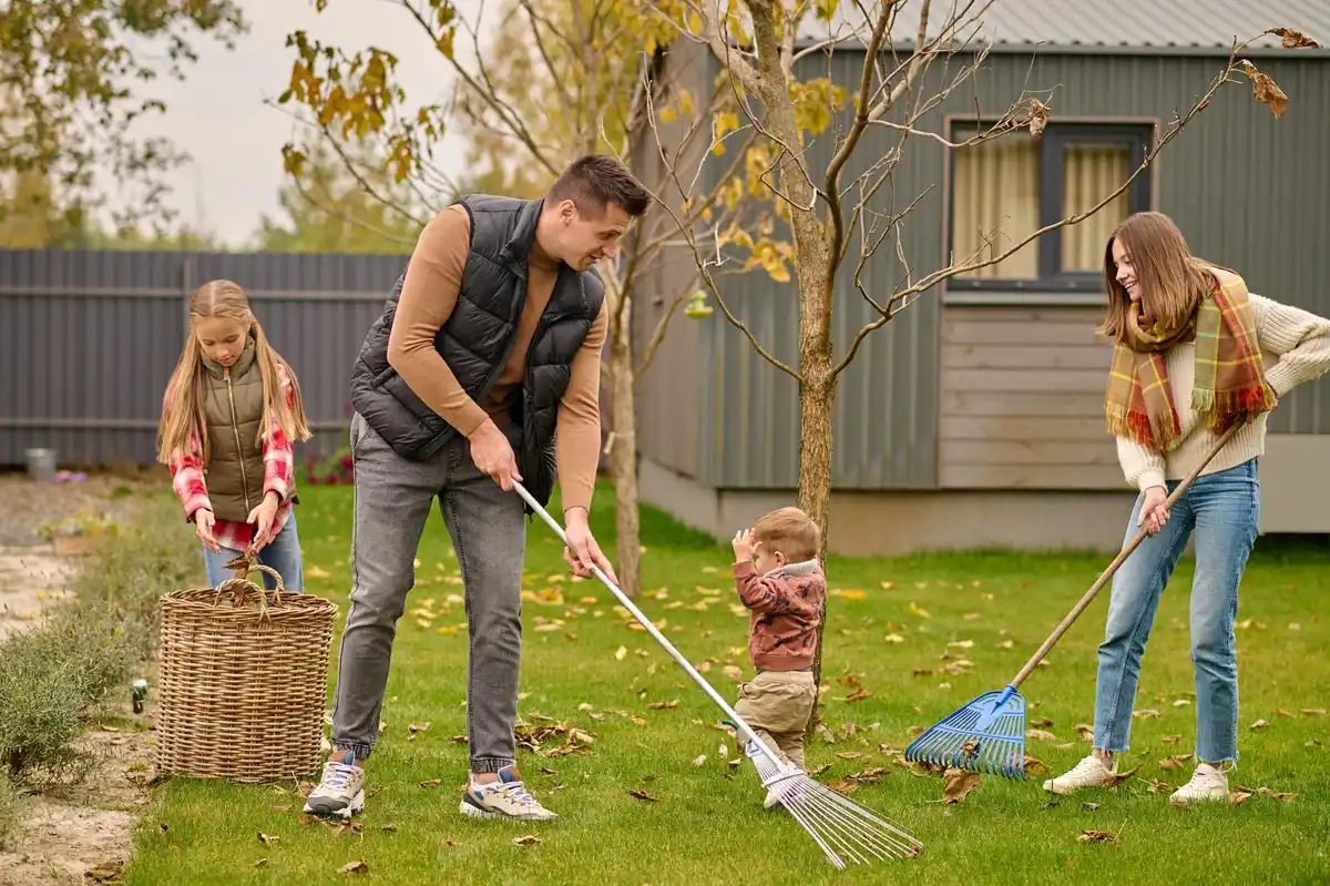 happy Dutch family gardening with homemade compost