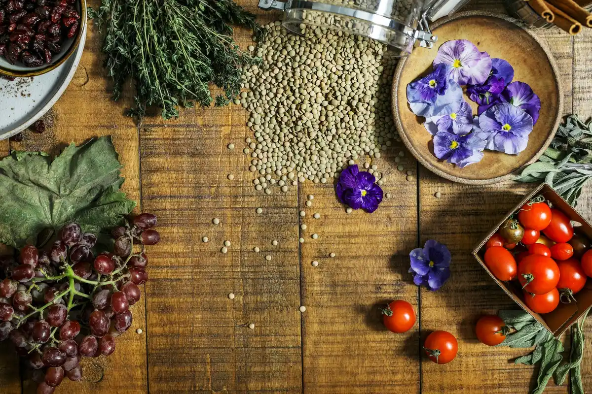 mix of vintage and modern vegetable seeds on dutch wooden table