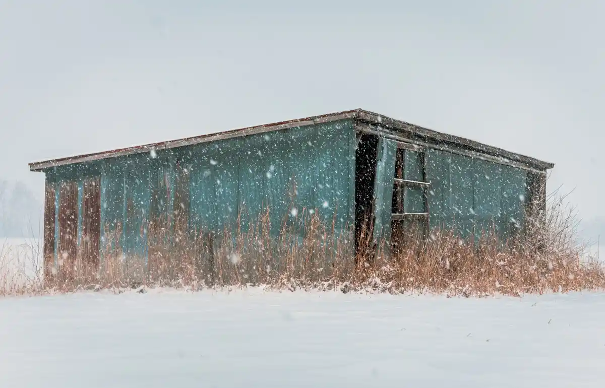 dutch greenhouse in winter frost gardening