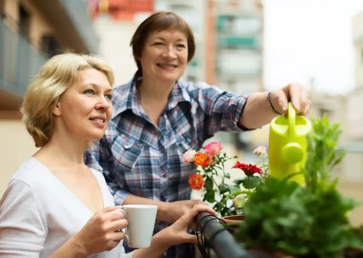 elderly dutch people gardening smile backyard