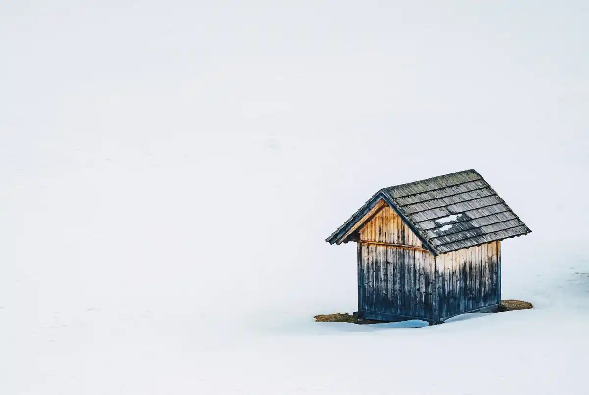 small greenhouse with frost on windows Dutch garden winter