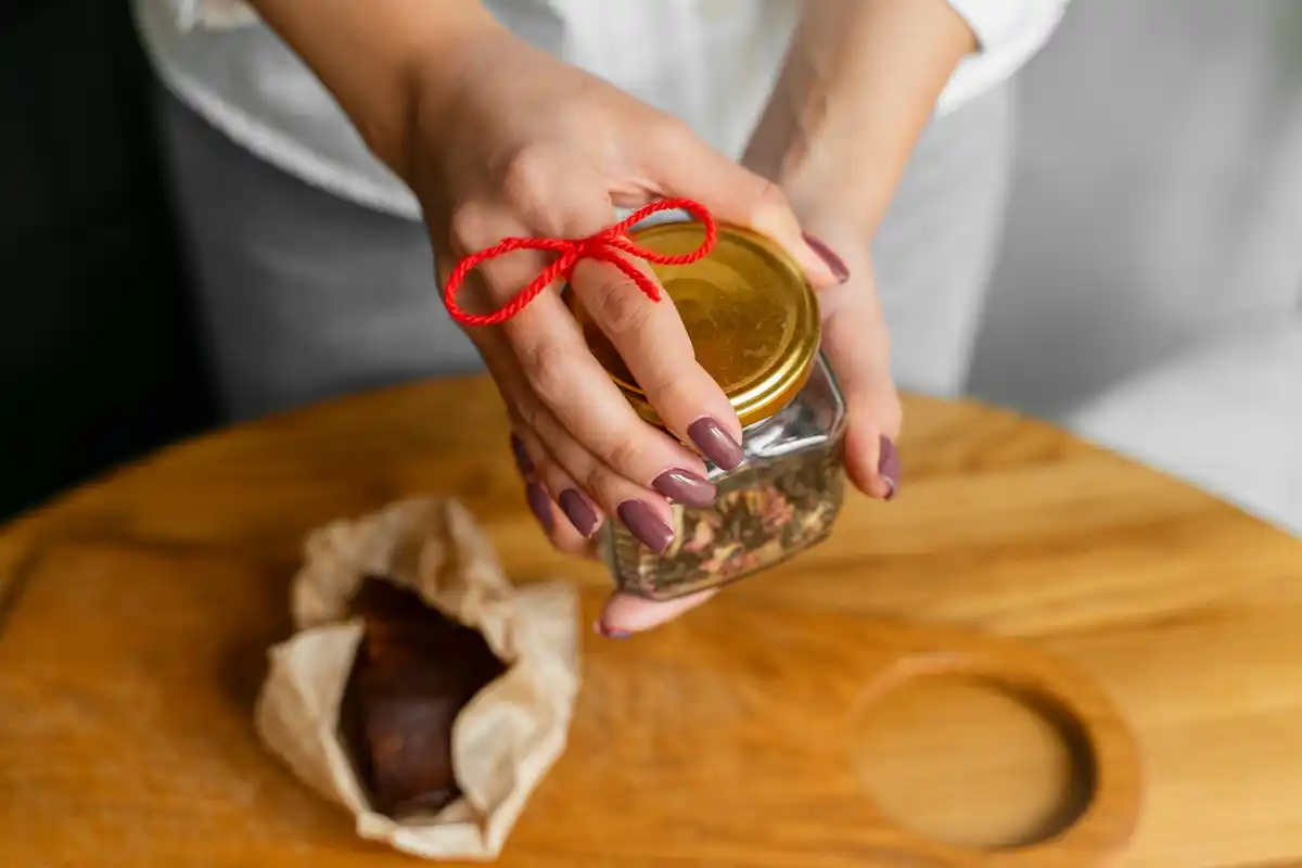 seeds stored in glass jars with handwritten dates, home gardening, Dutch kitchen