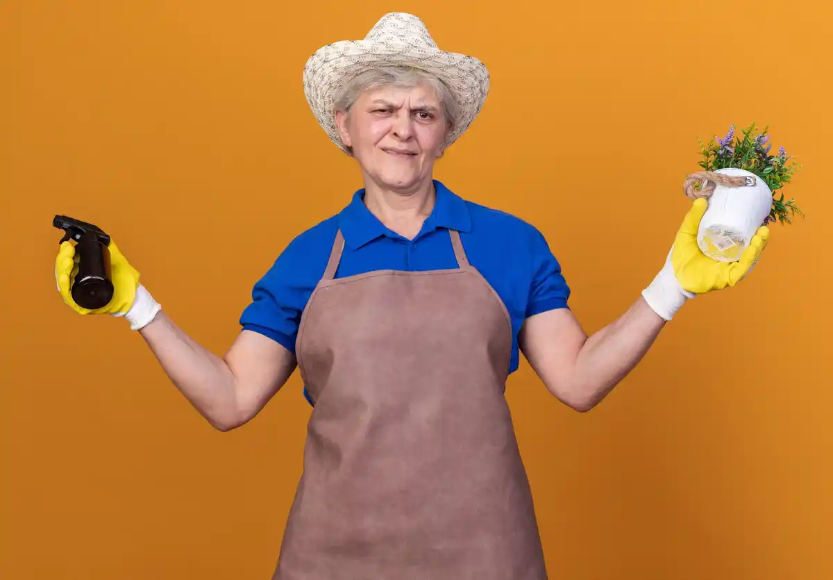 dutch grandmother cleaning kitchen with soap and bucket