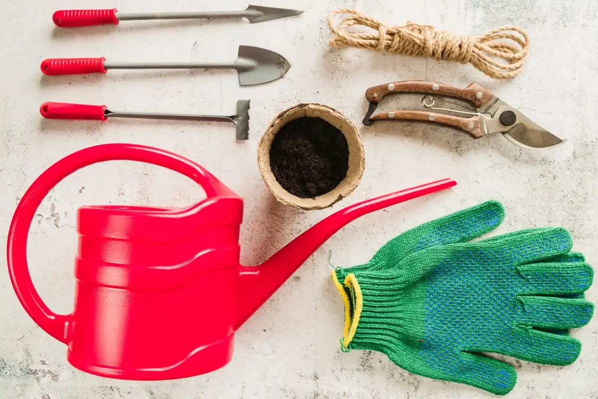 garden tools cleaning with sand and oil in bucket