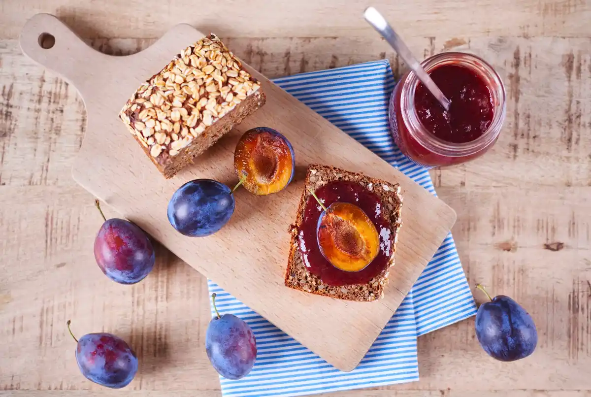 homemade dutch plum jam on bread rustic