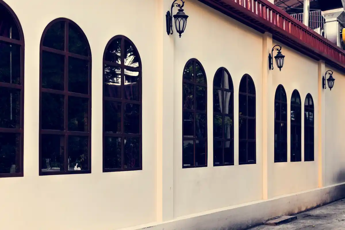 greenhouse made from vintage windows in Dutch backyard