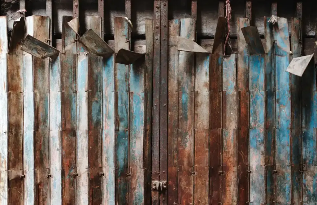 rusty and moldy garden tools Dutch shed