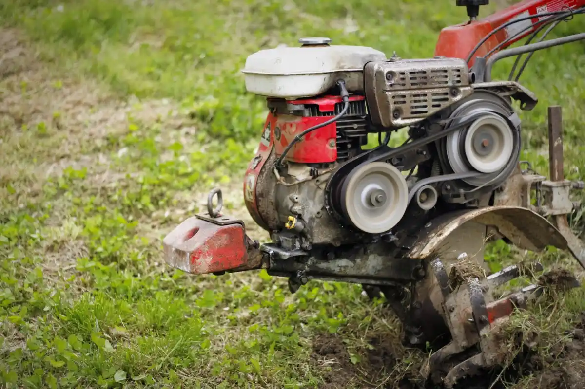 overgrown clogged lawn mower maintenance problem