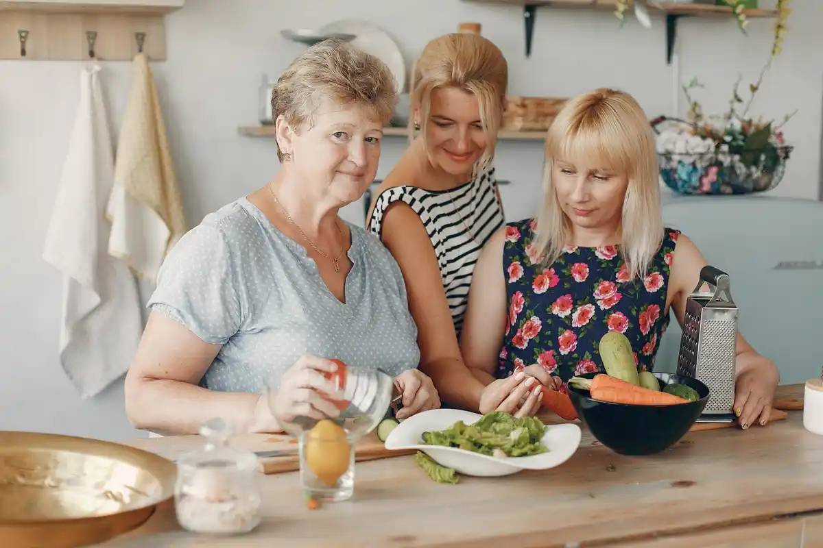 grandmother making plant food at home netherlands kitchen table