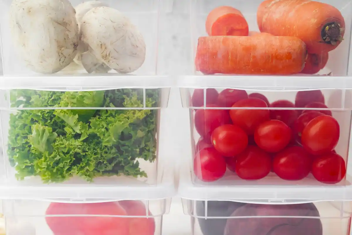 variety of vegetable seeds in jars in fridge