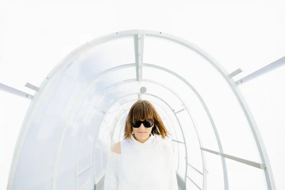 white sheet covering greenhouse sun protection