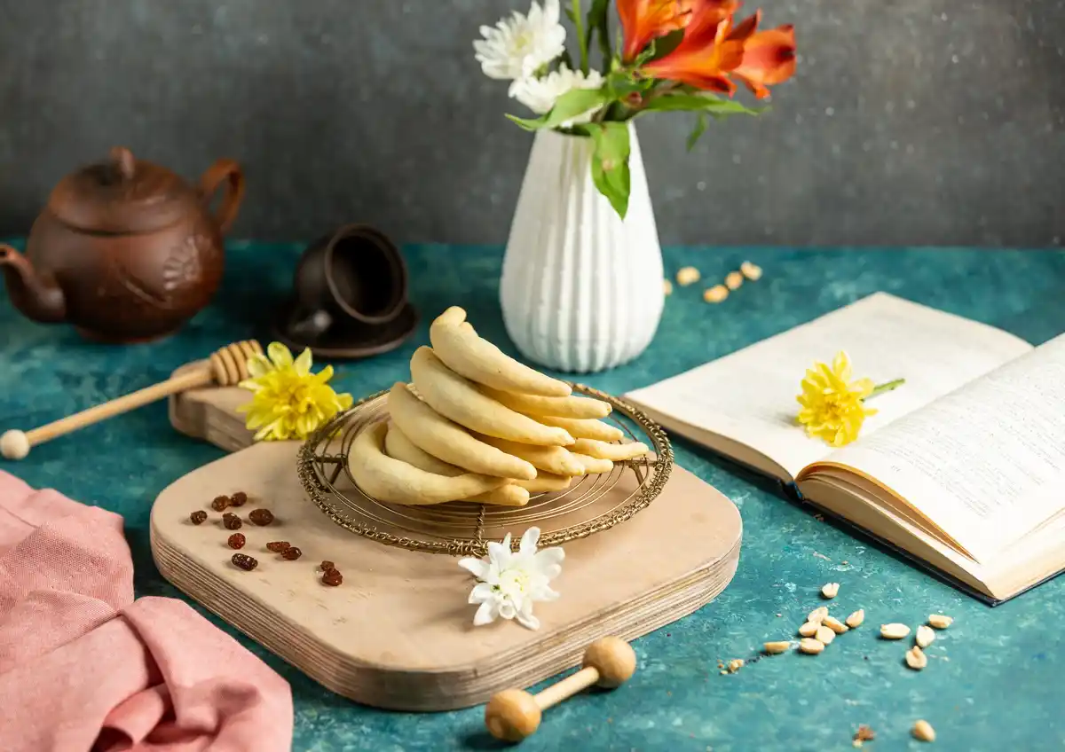 close up shot of banana peels soaking in a mason jar of water, on a Dutch kitchen table