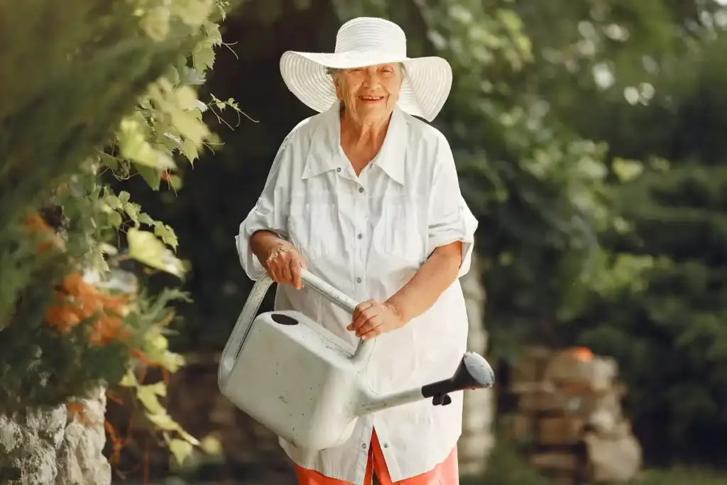 elderly woman gardening raised bed netherlands