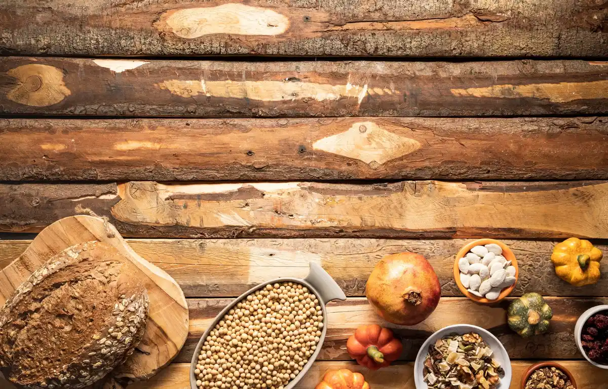 fresh vegetable seeds on rustic wooden table