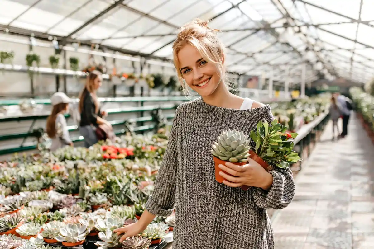 elderly dutch woman gardening homemade greenhouse tunnel