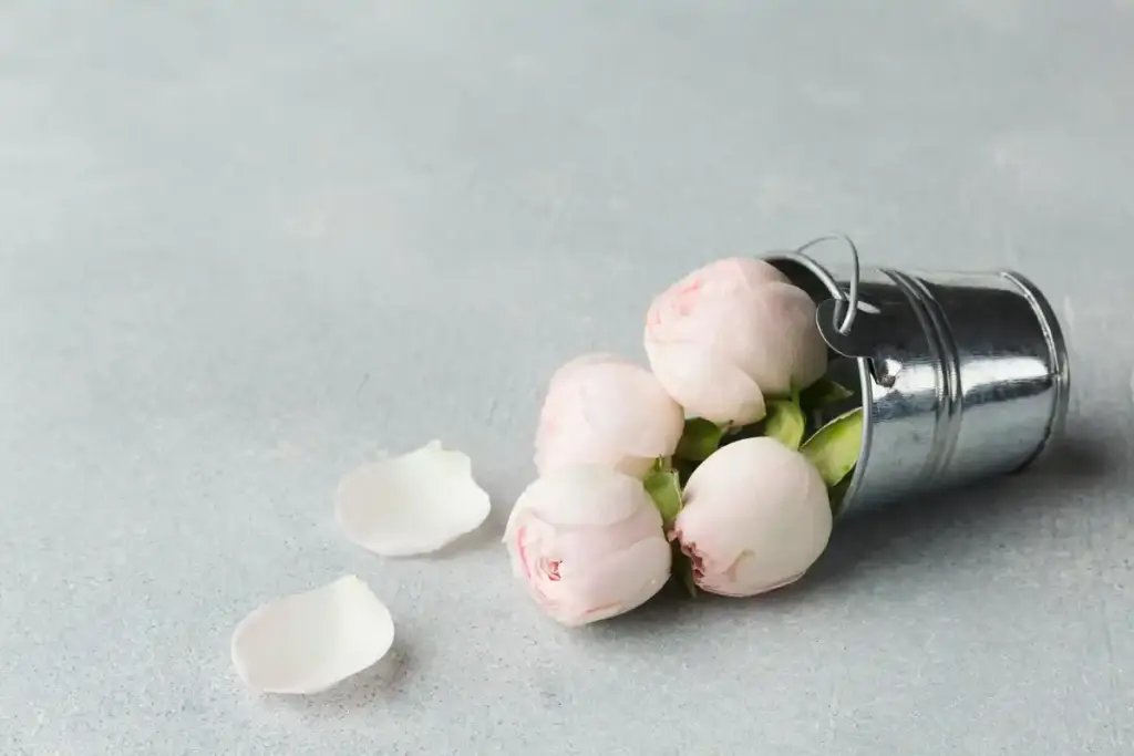 aspirin tablet with bouquet of fresh cut flowers