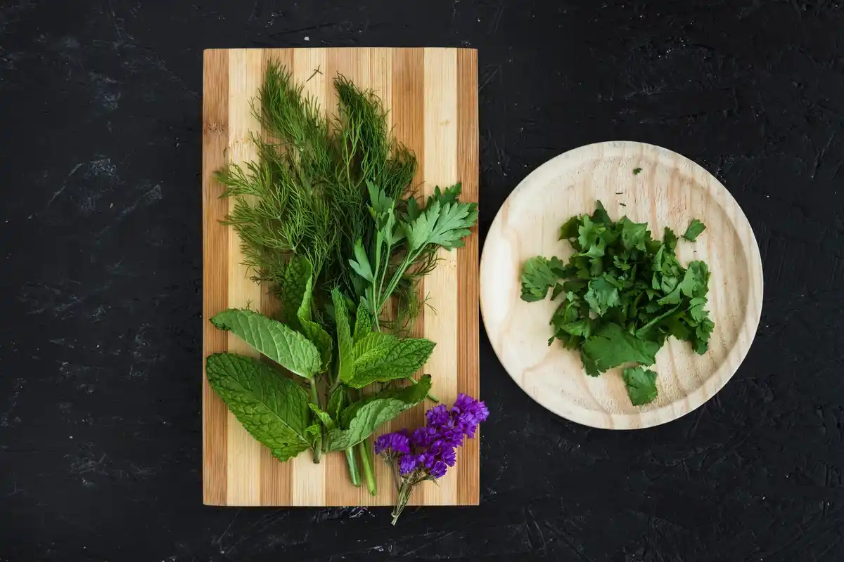garden herbs with basil and parsley separated