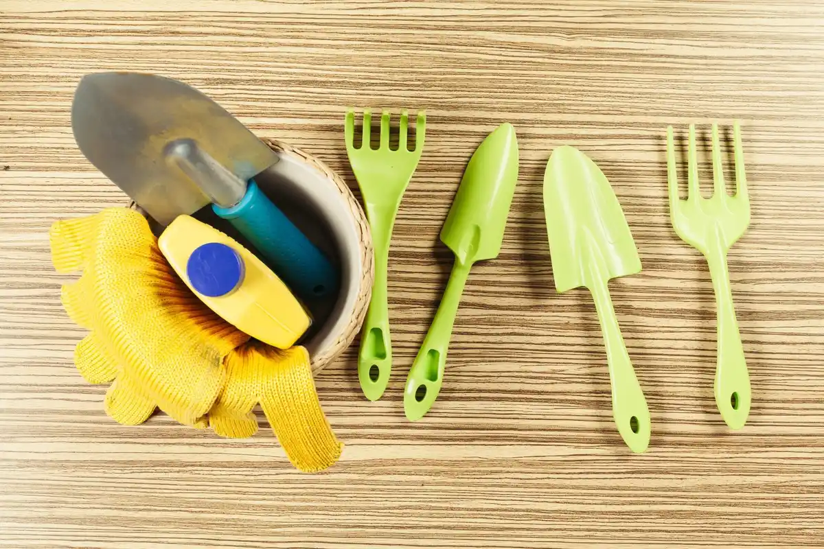 cleaning garden tools bucket sand oil